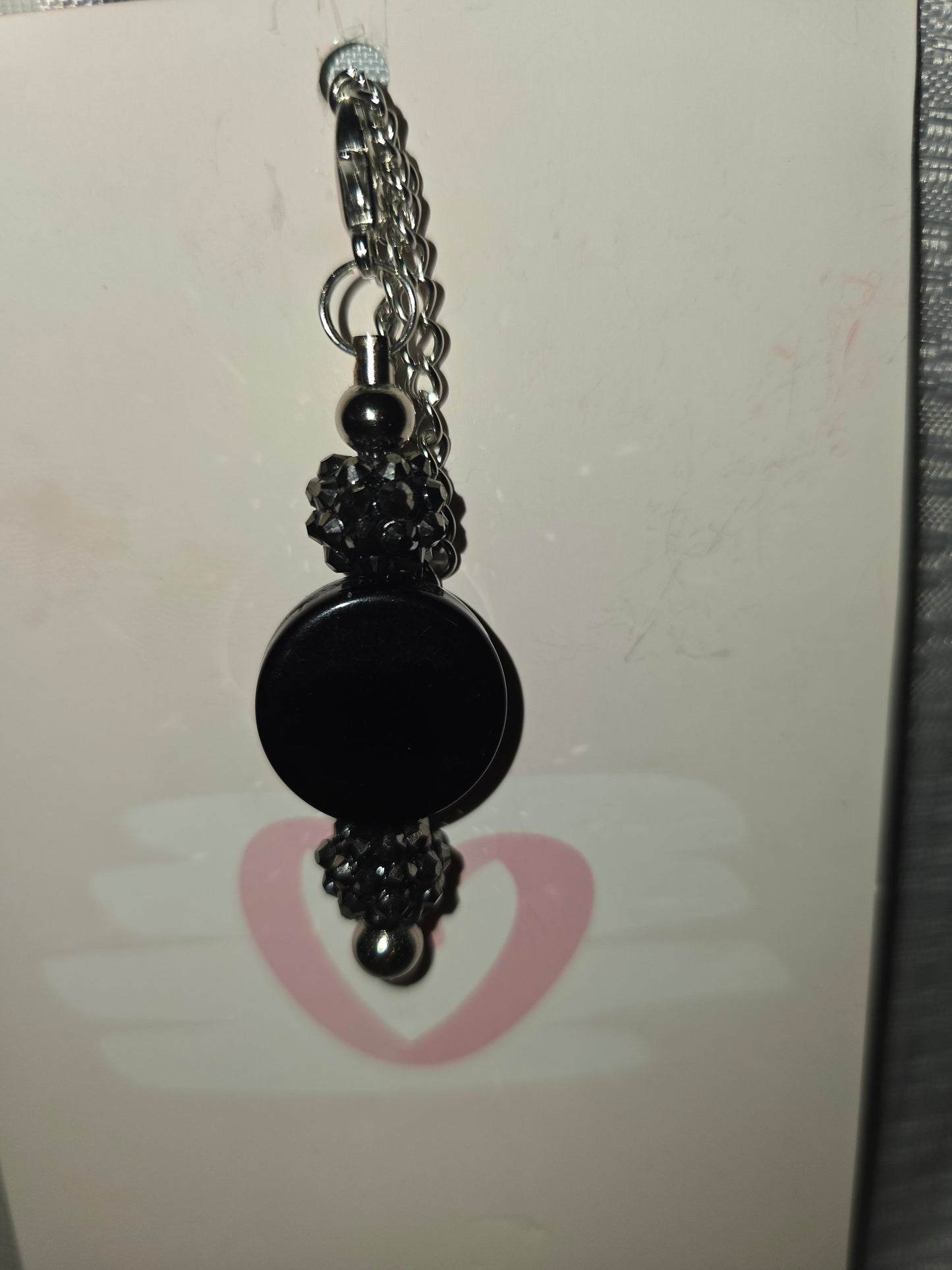 Black cup charm